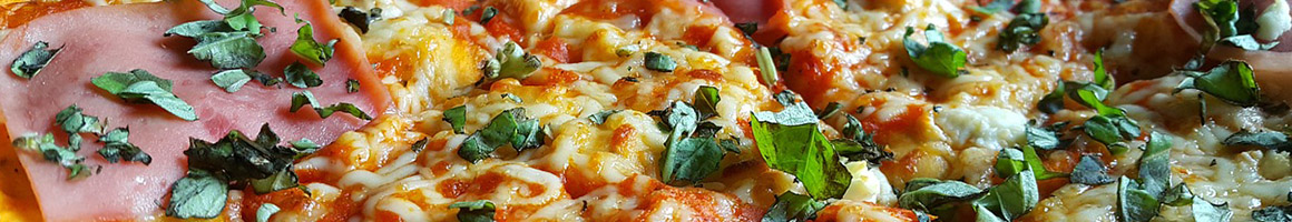 Eating Pizza at Zara Pizza restaurant in Selden, NY.